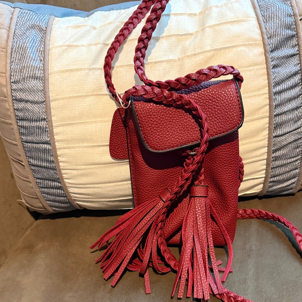 Red Leather Crossbody Bag with Braided Strap and Tassels